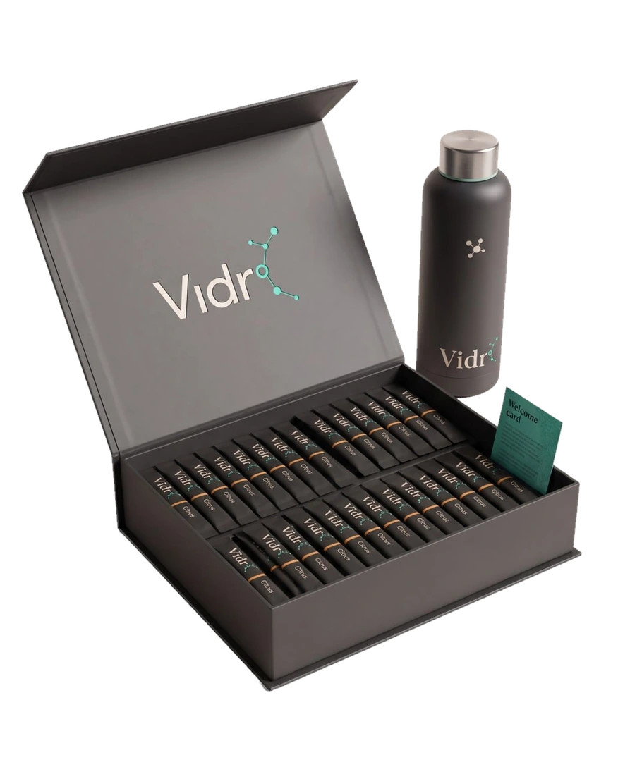 Vidr° founding member box with 28 citrus sachets, steel bottle, and welcome card